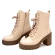 Nessi bélelt bézs bőr fűzős magas sarkú bakancs, belső oldalán cipzárral